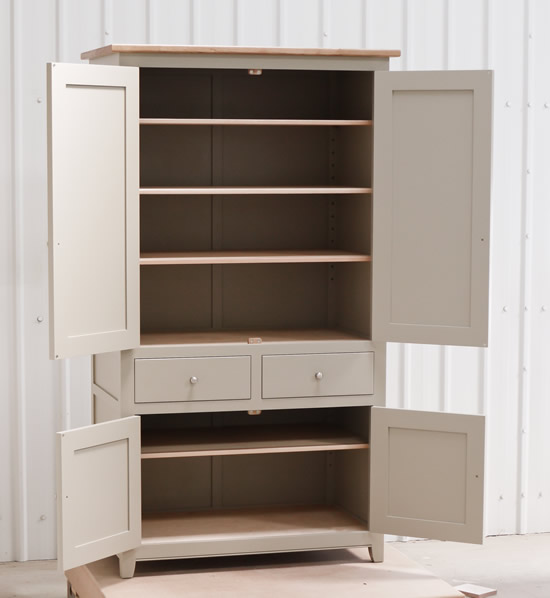Larder cupboard handpainted in Farrow and Ball Estate Eggshell - Light Gray. Tulip wood carcass construction with birch ply panels and shelves. Oak dovetailed drawers and oak cornice.