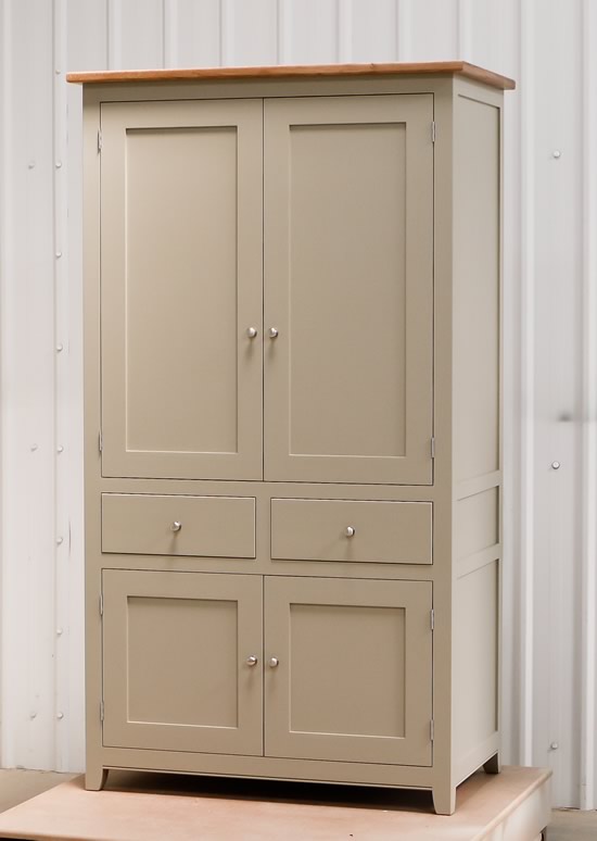 Larder cupboard handpainted in Farrow and Ball Estate Eggshell - Light Gray. Tulip wood carcass construction with birch ply panels and shelves. Oak dovetailed drawers and oak cornice.