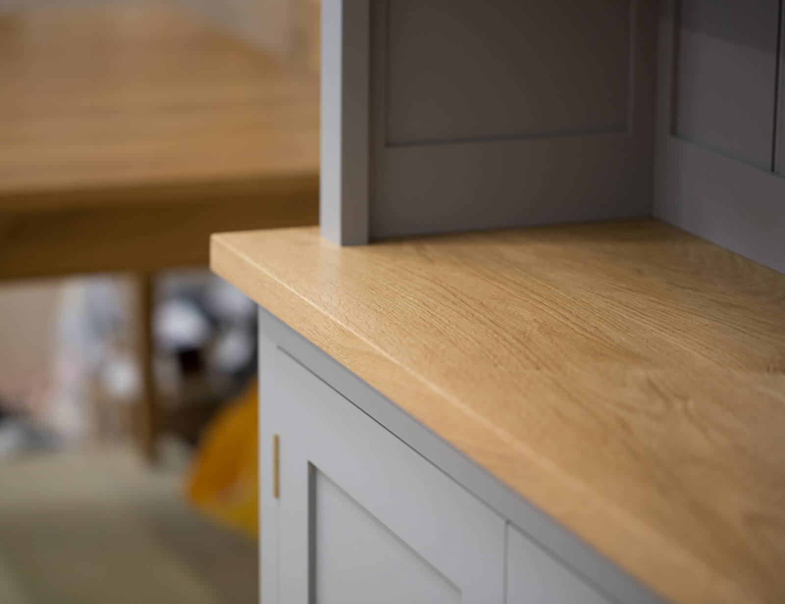Dresser handpainted in Farrow & Ball Estate Egshell - 'Worsted'. Tulip wood frame with birch ply panels. Oak veneered and lipped birch ply shelves. Hand-turned hardwood knobs. Traditional brass butt hinges with bespoke soft close function. Adjustable 'hidden' levelling feet.