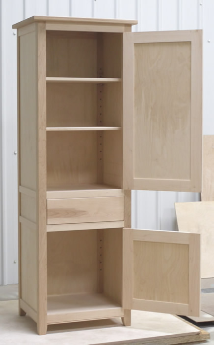 Small larder cupboard before painting. Solid maple carcass construction with birch ply panels and shelves. Oak dovetailed drawers and oak cornice.